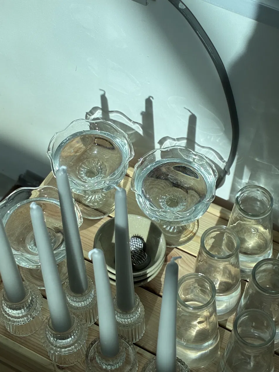 Glassware and candles in the studio light